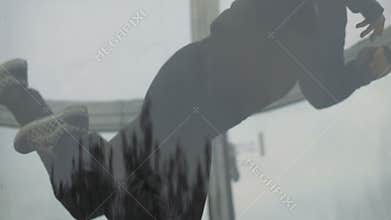 Man skydiver flying in wind tunnel. Training jumping indoor skydiving tunnel