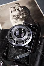 Old camera and old photo