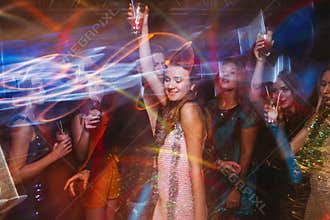 New Year party at night club in blurred motion