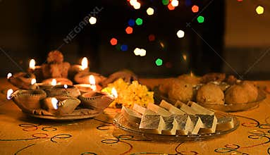 Diwali Lamps with Indian Sweets
