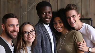 Diverse happy young people posing making photo, looking at camera