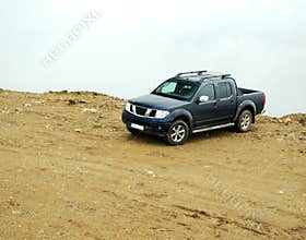 Pick-up truck on road
