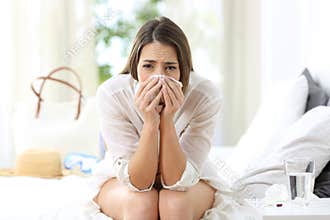Ill allergic woman looking at you on vacations