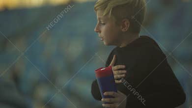 Little boy choking on water and coughing, hard breathing, emergency concept