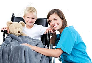 Female doctor carrying adorable boy