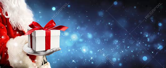 Santa Claus Giving A Giftbox