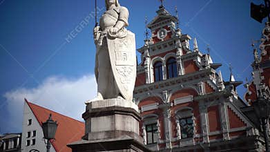 View of a monument to Roland at Town Hall Square against the background House of the Blackheads of Riga Latvia