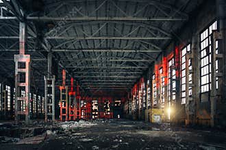 Large empty abandoned warehouse building or factory workshop, abstract ruins background