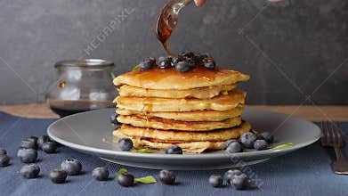 Prepare fluffy pancakes with blueberries