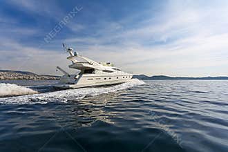 Motor-yacht cruising at full speed