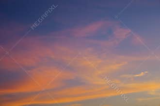 Sunset sky with orange clouds, abstract background