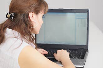 Woman and computer screen