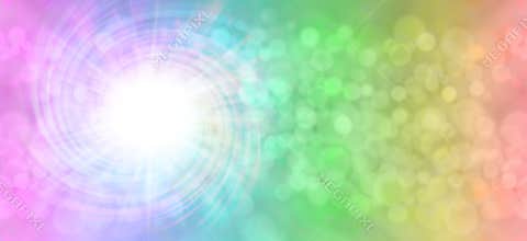 Rainbow spiral light burst bokeh background
