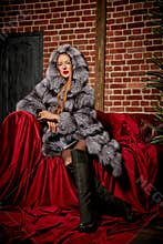 Woman in expensive fur coat