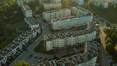 Solar panels installed on the roof of an apartment building for the production