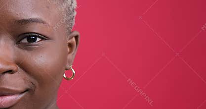Half face of smiling woman