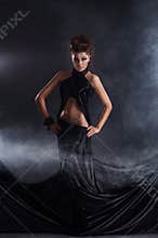 woman posing in a black dress