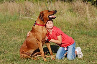 Child and dog - Happy Friendship