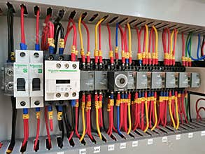 Selective focus image with noise effect a row various type of electrical relays.