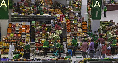 Dubai, UAE - 07.07.2021 - Customers and vendors at Waterfront market, fruits and vegetables section. Market