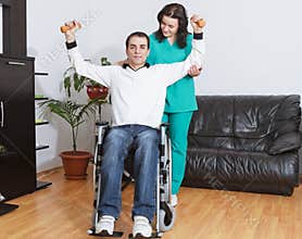 Physical therapist working with patient
