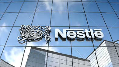 Editorial Nestle logo on glass building.