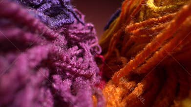 Macro dolly shot a sliding footage of a beautiful colored wool yarn texture. May be used for background. Laowa probe