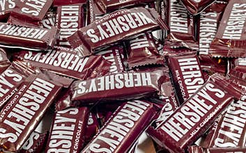 Hershey`s brand milk chocolate candy bars on a white background.