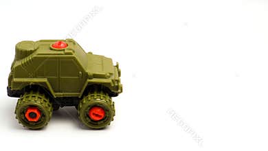 Children\'s Toy Car In The Shape Of A Military Jeep With White Background