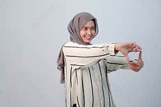 Body expression of Indonesian Asian woman wearing hijab