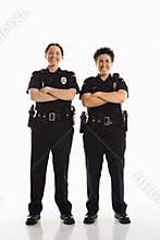 Policewomen crossing arms.