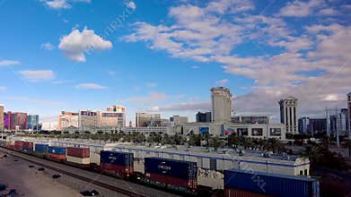 Las Vegas Skyline Panorama with Railroad: A Dynamic Aerial Perspective