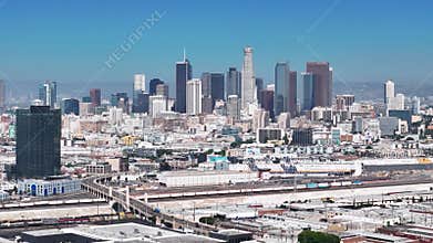 Aerial View of Downtown Los Angeles Capturing the Dynamic Skyline with Skyscrapers, Bustling Streets, and Extensive Freeway System
