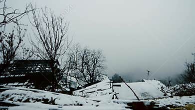 The glow upon the snow-covered roofs Jammu Kashmir