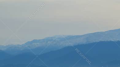 Misty Forest Sunrise. The Cloud Stream Against A Background Of A Mountains. Timelapse.