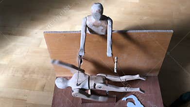 Sports swimming, coach mentor teaches athlete to swim, wooden doll automaton