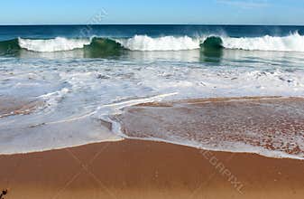 Indian Ocean waves rolling in at pristine Binningup Beach Western Australia on a sunny morning in late autumn.