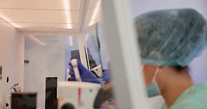 Biotechnology scientist team take test tube to conduct experiments in the laboratory. Advanced Scientific Lab for