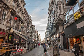LIEGE, BELGIQUE - NOVEMBER 9, 2022: Selective blur on Rue Pont d\'avroy, a shopping street of the city center of Liege, with