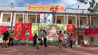 Vietnamese schoolgirls are practicing performing arts to prepare for the opening day of the new school year