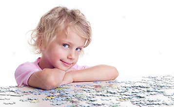 Girl playing puzzles