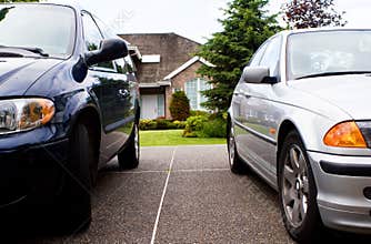 Two cars, house - suburban life