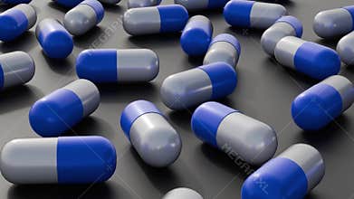A 3d animation of blue and white capsules scattered across a dark surface
