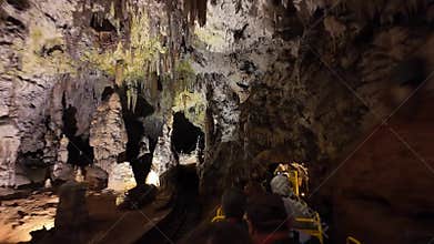 Small train ride in the impressive Postojna Caves, a World Heritage Site, Slovenia.