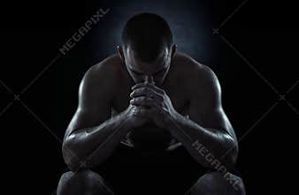 Young sportsman focusing