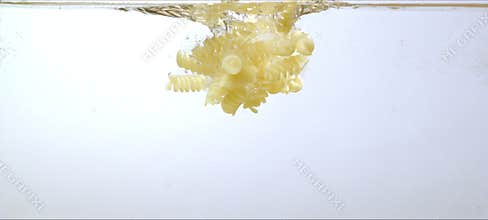 Vivid paints slowly bloom and dance in clear water. Mesmerizing fluid art