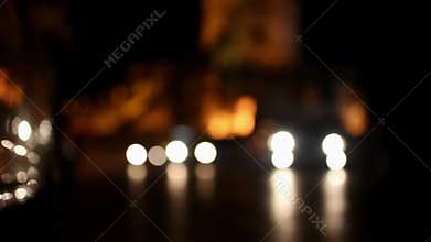 Active traffic on the road at night in background