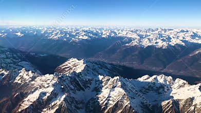 Aerial view of Alps mountains under Italy, Austria and Swiss form plane, 4k footage video