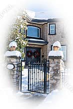 Luxury residential house entrance decorated for Christmass. White round borders
