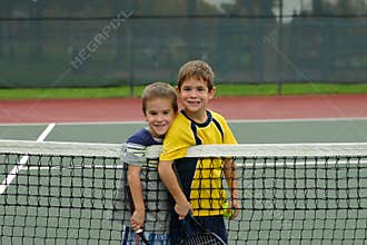 Two Boys Playing Tennis